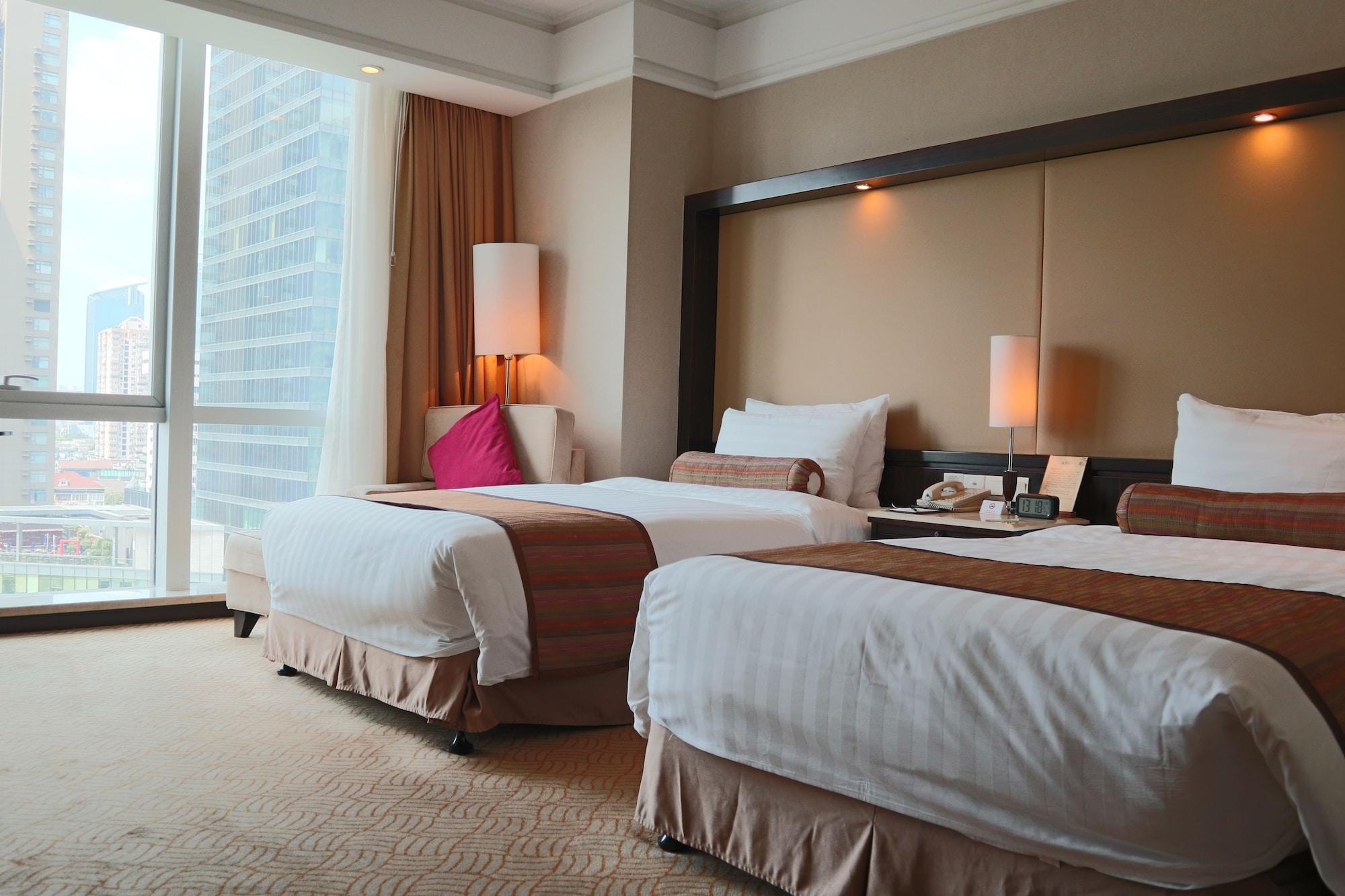 Howard Johnson Huaihai Hotel Shanghai Bagian luar foto